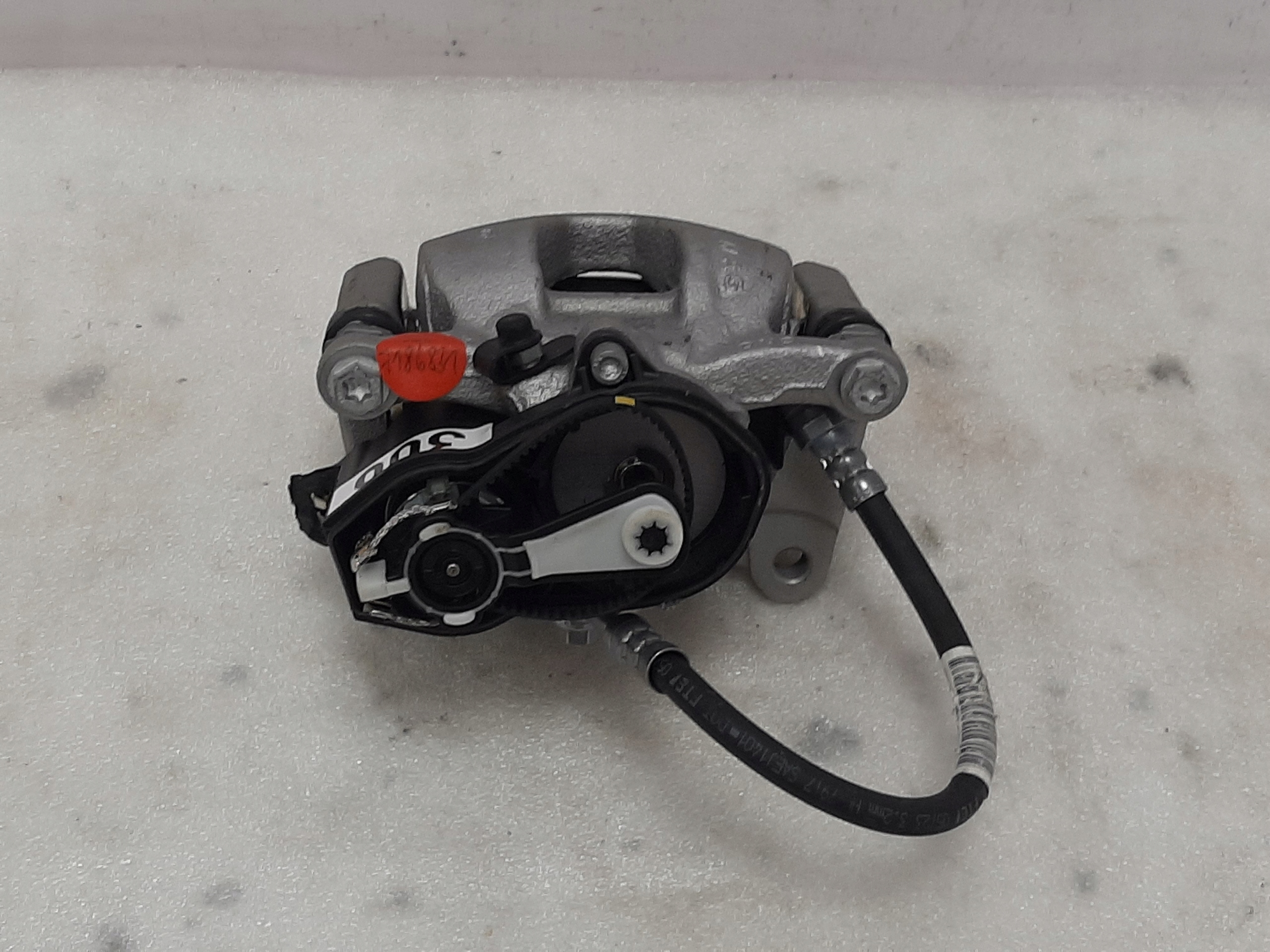 Zacisk Audi A4 A5 A6 A7 Lewy Tył 8W0405CF - galeria